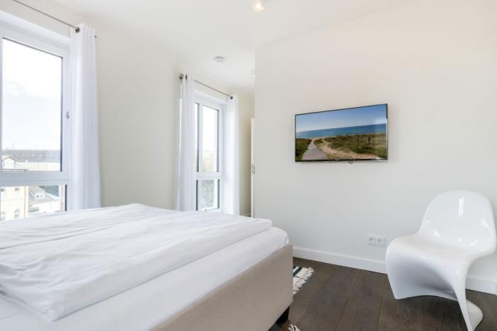 Appartement-Vermietung Bals -  - Klaus-Groth-Straße 3 | 7 Üp Taak | Sylt | Westerland, 3-Zimmer-Penthouse für 4 Personen mit 2 Schlafzimmer, 2 Badezimmer, ca. 108 m2, Fahrstuhl im Haus