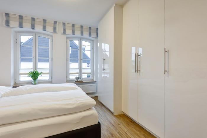 Appartement-Vermietung Bals - Stadthaus Bötticherstraße - Bötticherstraße 2 | Wohnung 3 | Sylt | Westerland, 2-Zimmer-OG-Wohnung für 2 Personen mit 1 Schlafzimmer, 1 Badezimmer, ca. 40 m2