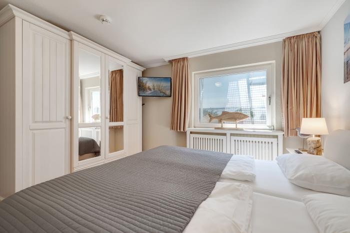Appartement-Vermietung Bals - Haus Atlantik - Strandstraße 15 | Wohnung 1 | Sylt | Wenningstedt, 3-Zimmer-EG-Wohnung  | Maisonette für 4 Personen mit 2 Schlafzimmer, 1 Badezimmer, ca. 69 m2
